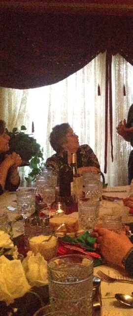 My grandma, hearing something that made her make that face. And my mom is on her right (camera left) being like, "Ohhh," to whatever was being said.